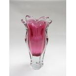 A Czech cranberry vase cased in clear by Josef Hospodka for Chribska Glassworks 25cm high