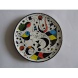 A Spanish Ceramar Pottery plate in the style of Kandinsky. 17.