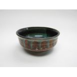 A David Sharp Rye pottery bowl with green glazes, 5.5cm x 12.