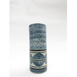 A Troika small cylindrical vase in blue with circle detail,