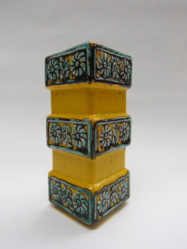 An Ubelacker West German square form vase, bright yellow glaze with turquoise florets. No.1299/20.