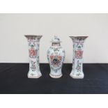 A pair of Samson style armorial vases and lidded baluster vase (3)