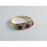 An 18ct yellow gold diamond and ruby ring,