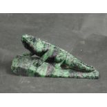 A Zoisite and natural ruby carving of a lizard, 19.