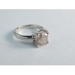 An 18ct white gold diamond solitaire, natural fancy brown/pink, 2.