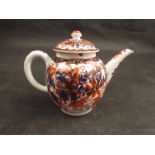 A Lowestoft clobbered pattern bullet shape teapot with cover, spout repaired, 14cm high,