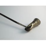 A Georgian candle snuffer with bronze hand design