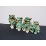 Four green glazed dogs of Fo,