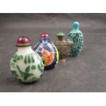 Four various opium bottles including carved turquoise coloured example,