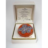 A Saint Louis paperweight Millefiori on orange ground 1984 245/400