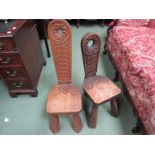 Possibly Peter Heap of Wetwang, Nr Driffield two carved oak spinning chairs with scroll,