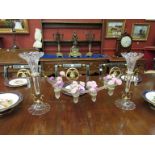 A Victorian glass and ormolu epergne two glass fluted vases joined together by a glass and ormolu