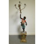 An Italian Blackamoor figural candleabra with gilt metal sconces 146cm,