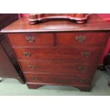 A circa 1800, an oak chest of two short, over three graduating long drawers on bracket feet,