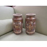 A pair of circa 1900 Satsuma vases with Oriental figural detail,