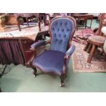 A mid-Victorian button spoon backed walnut armchair,