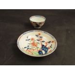 A Lowestoft Redgrave pattern tea bowl and saucer,