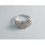 A three stone diamond ring 4.