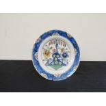 A 19th Delft charger, tree and bridge to centre, floral blue border,