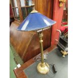 An Edwardian brass lamp with blue enamel shade,