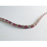A diamond and ruby set tennis bracelet 2ct approx each of diamond and ruby total