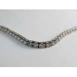 A diamond tennis bracelet, 4.