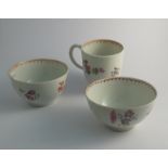 Two Lowestoft flower pattern tea bowls and a similar coffee can (3)