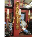 A pair of gold painted three arm wall lights,