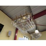 A French ormolu and crystal glass square tiered chandelier,