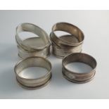 Six various silver napkin rings,