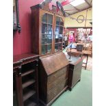 An early 20th Century Queen Anne style bookcase bureau with broken arch top,