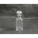 A silver collared Whisky decanter,