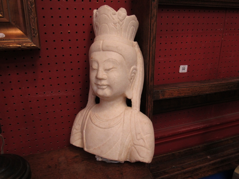 A late 19th Century marble bust of a deity,