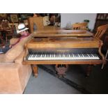 A walnut John Broadwood and Sons boudoir grand piano (7' x 4' 6") A to A,