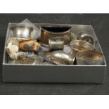 A tray of miscellaneous including a Metropolitain police whistle, silver pepperettes,