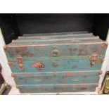 A late Victorian trunk, lathe bound body with labels and script painted green,