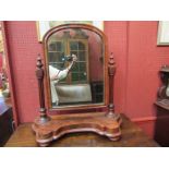 A Victorian serpentine based table top mirror, with domed arched swing mirror,