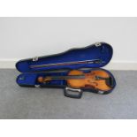 A cased violin