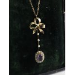 A 9ct gold Edwardian amethyst and seed pearl drop pendant on chain