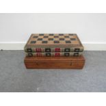A late 19th Century chess and draught board made in the form of two library books "History of