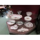 A quantity of George Jones white ground china with pink rose and gilt embellishment including ink