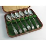 A Peter, Ann & William Bateman silver set of six teaspoons with bright cut handles,