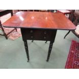 A circa 1840 flame mahogany drop leaf table the rising leaves over two end drawers and two faux