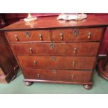 A William & Mary walnut two over three chest of drawers, later feet, oak lined drawers,