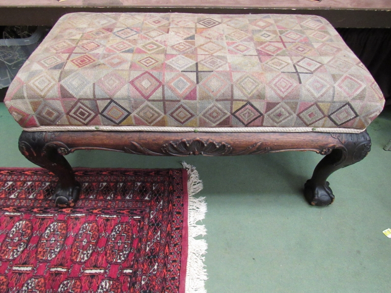 A 19th Century Georgian style large centre stool on cabriole legs to claw and ball feet a/f,