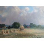 OWEN WATERS (1916-2004) : A framed oil on board depicting Norfolk harvest scene, 29 x 39cm,