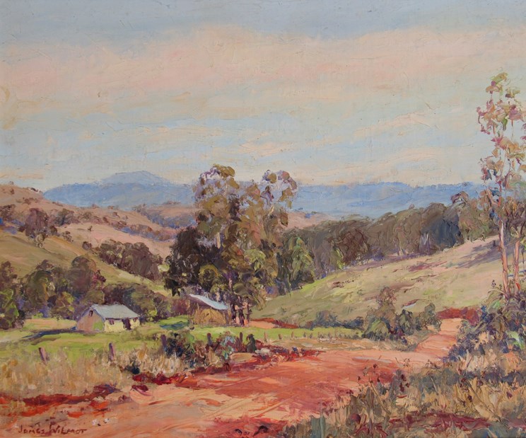 JAMES WILMOT (XX Australian) : A framed oil on board depicting a rural scene buildings to the