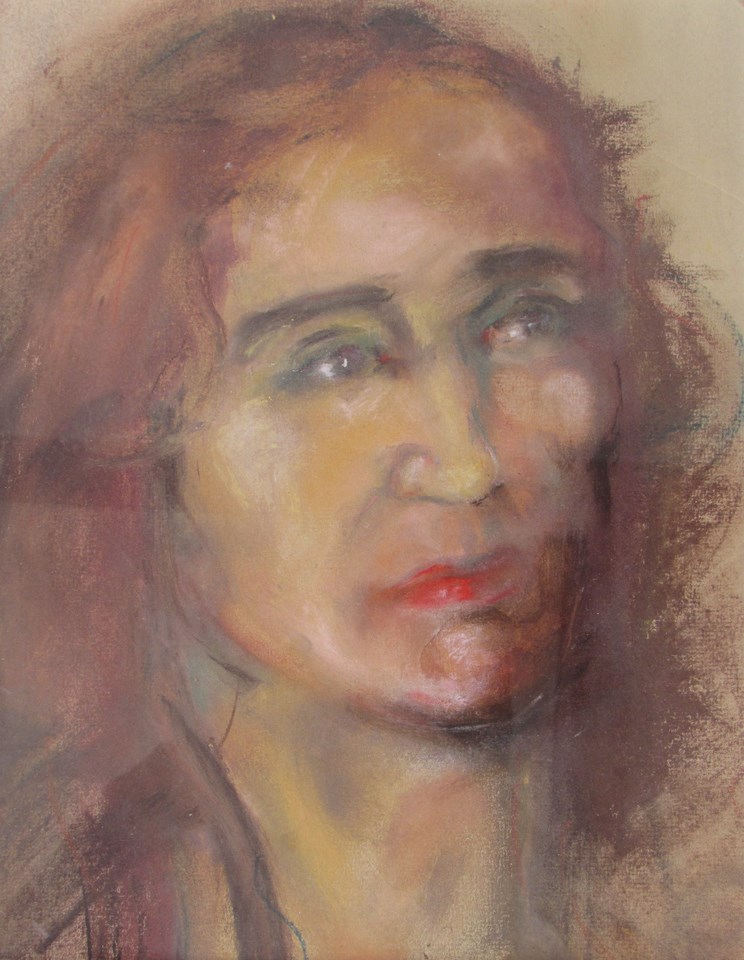 An unsigned framed and glazed pastel portrait of female head.