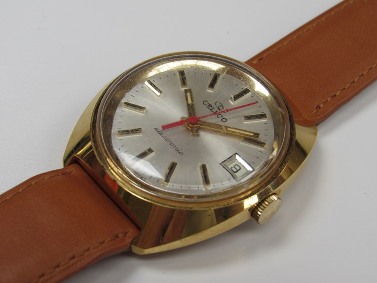 CELLCO: a gold plated and steel cased electronic gent's wristwatch,