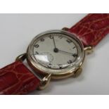 A 9ct gold gent's wristwatch with teardrop shaped lugs,